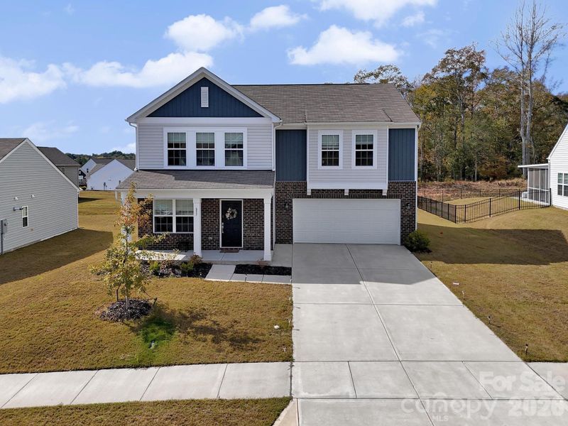 Front exterior of a new home in , Edgemoor, SC, highlighting curb appeal (Image 22).