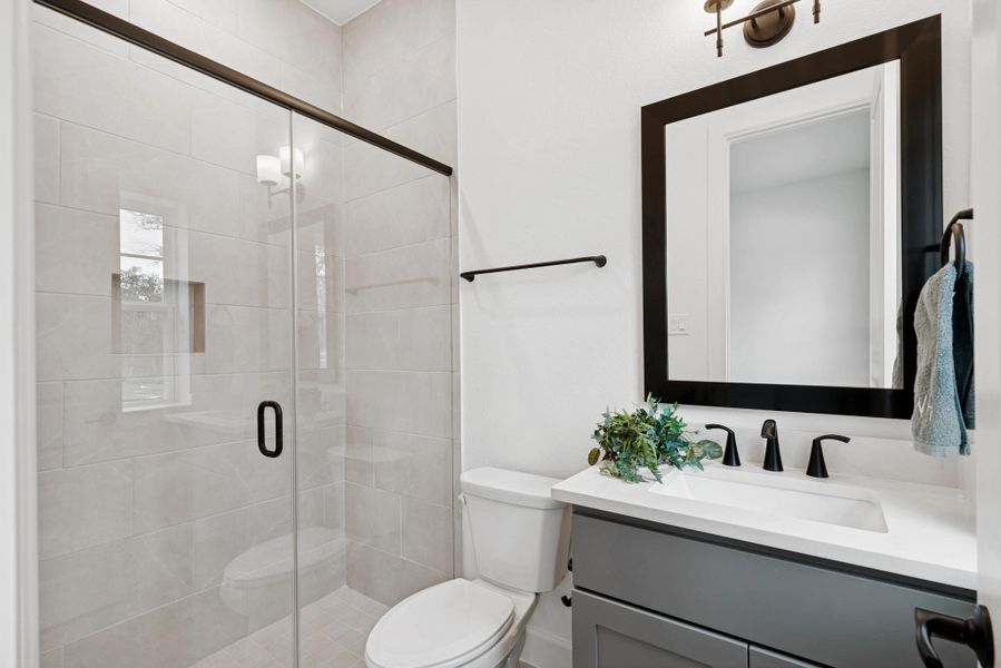 Ensuite bath with walk in shower at 1st floor guest bedroom