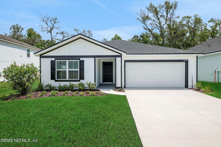 Front exterior of a new home in Wilford Oaks, Orange Park, FL, highlighting curb appeal (Image 2). Front exterior of a new home in Wilford Oaks, Orange Park, FL, highlighting curb appeal (Image 2).