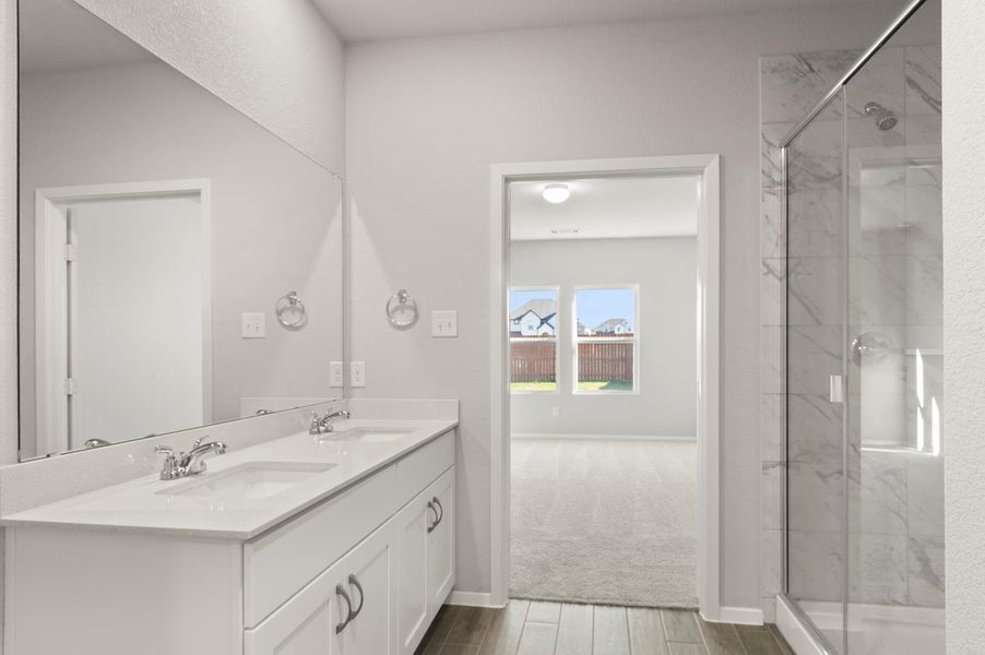 Furnished interior view inside a new home in Oaks at San Gabriel, Georgetown (Image 15).
