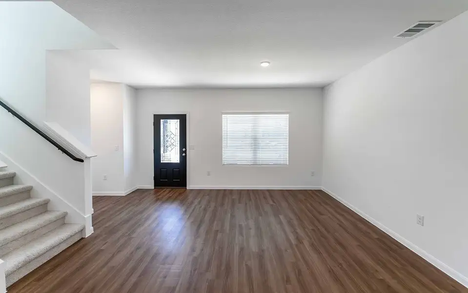 Spacious, unfurnished interior of a new home in Brooklands, Hutto (Image 8).