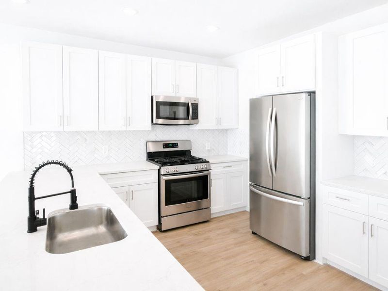 Furnished interior view inside a new home in Hill & Dale Ranch, Splendora (Image 3).