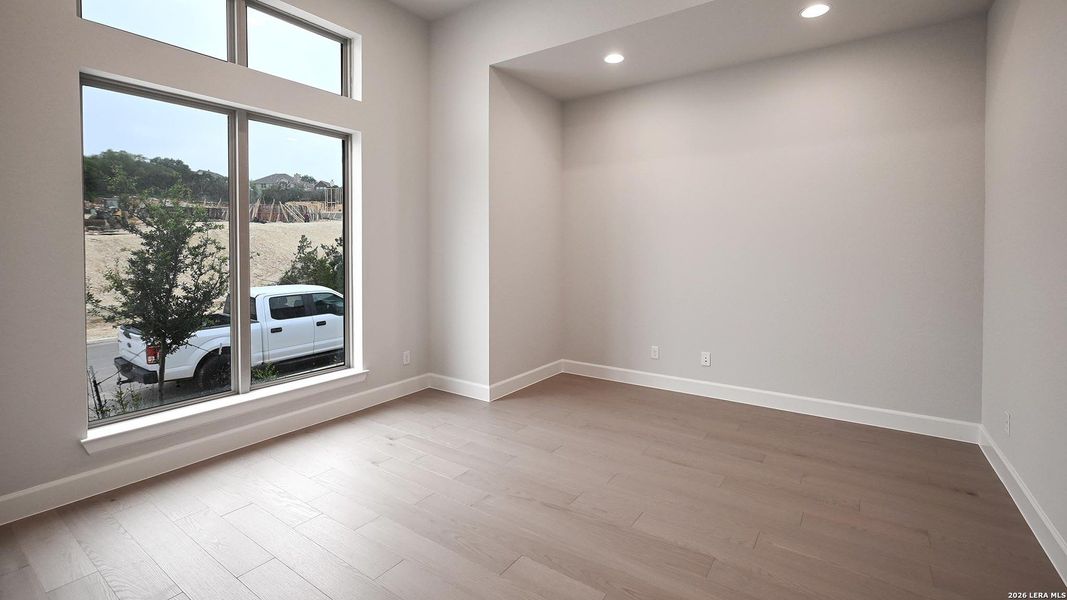 Spacious, unfurnished interior of a new home in Hidden Canyon, San Antonio (Image 13).