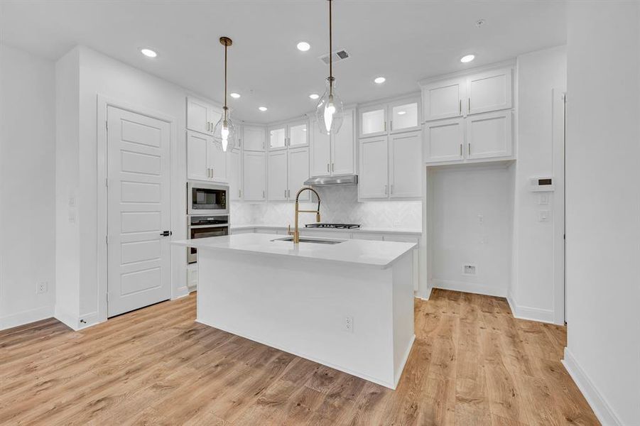 Furnished interior view inside a new home in Hillside at Las Colinas, Irving (Image 7). Furnished interior view inside a new home in Hillside at Las Colinas, Irving (Image 7).