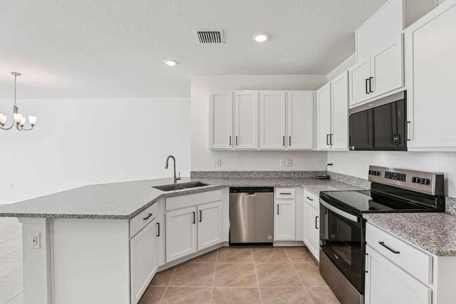 Furnished interior view inside a new home in Reserve at Forest Lake Townhomes, Lake Wales (Image 6).