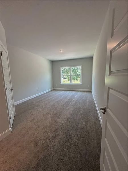 Spacious, unfurnished interior of a new home in Mirror Lake at South Harbour, Villa Rica (Image 26).