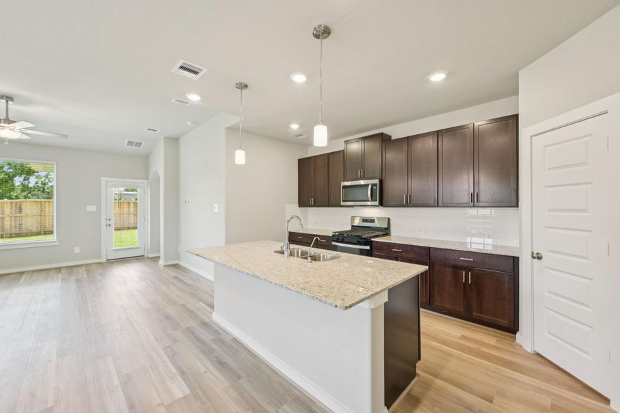 Furnished interior view inside a new home in Sundance Cove - Premier Series, Crosby (Image 17).