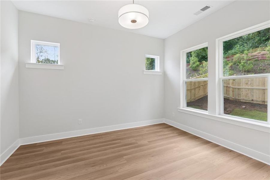 Spacious, unfurnished interior of a new home in Settingdown Farms, Cumming (Image 24).
