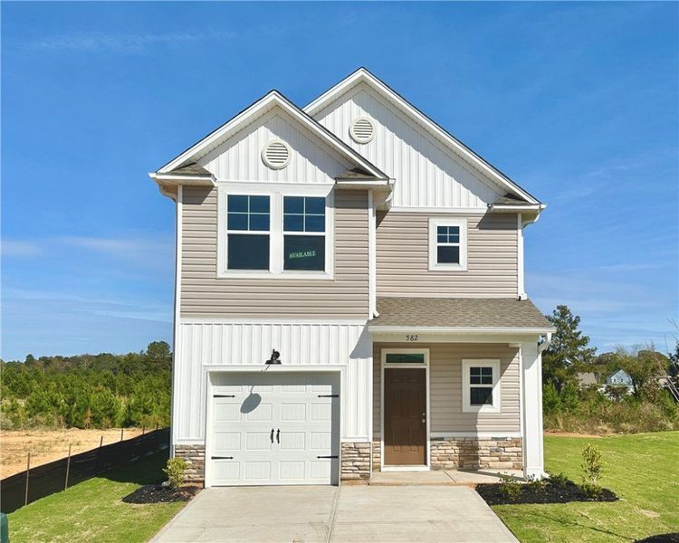 Front exterior of a new home in Champions Village at Cherry Hill, Pendleton, SC, highlighting curb appeal (Image 1).