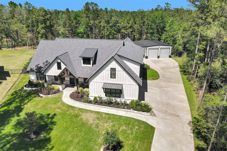 Aerial view showcasing full property