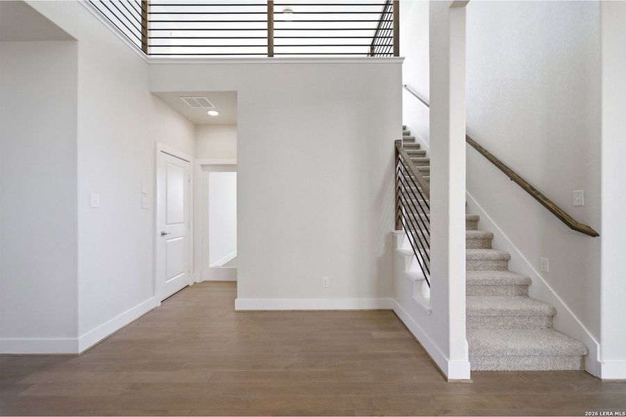 Spacious, unfurnished interior of a new home in The Woodlands at Medina Hills, Mico (Image 34).