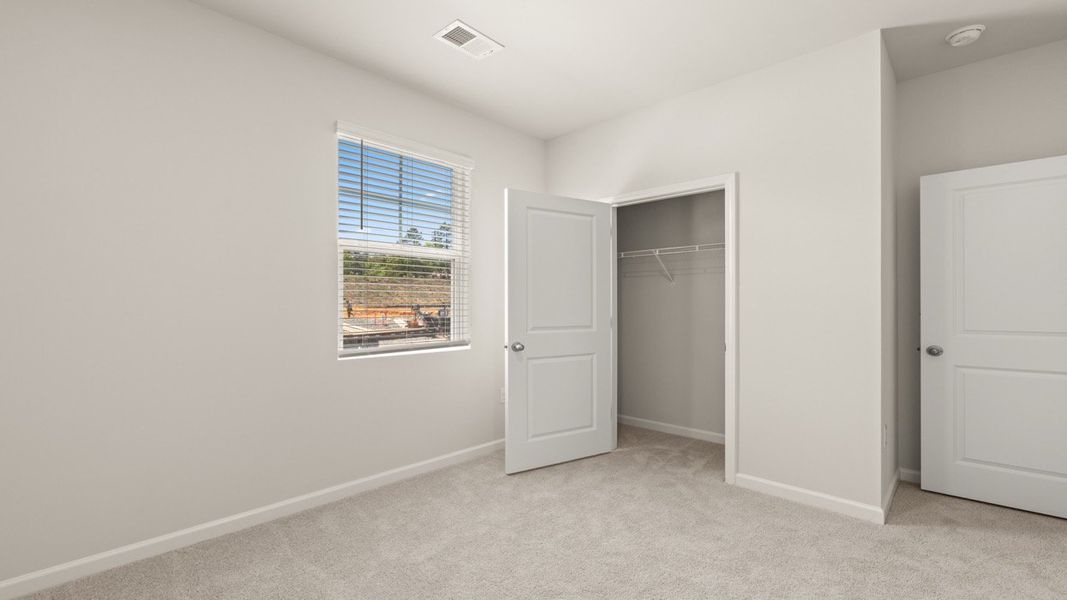 Spacious, unfurnished interior of a new home in Byrd Village, Graniteville (Image 14).