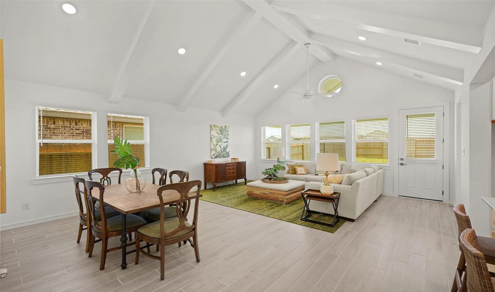 Vaulted ceilings with painted beams in dining area and great room (*Photo not of actual home and used for illustration purposes only.)