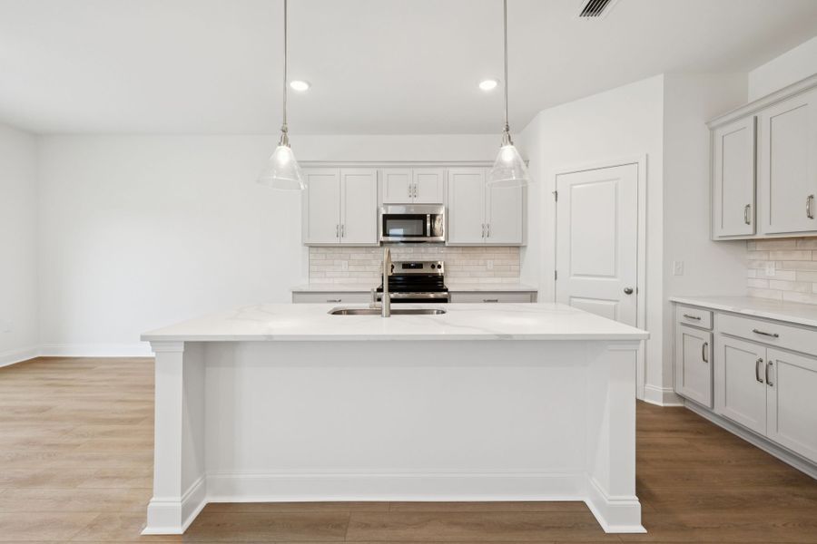 Representative furnished interior of a home built from the Montgomery by Ashton Woods in Cades Bluff, Lebanon (Image 4).