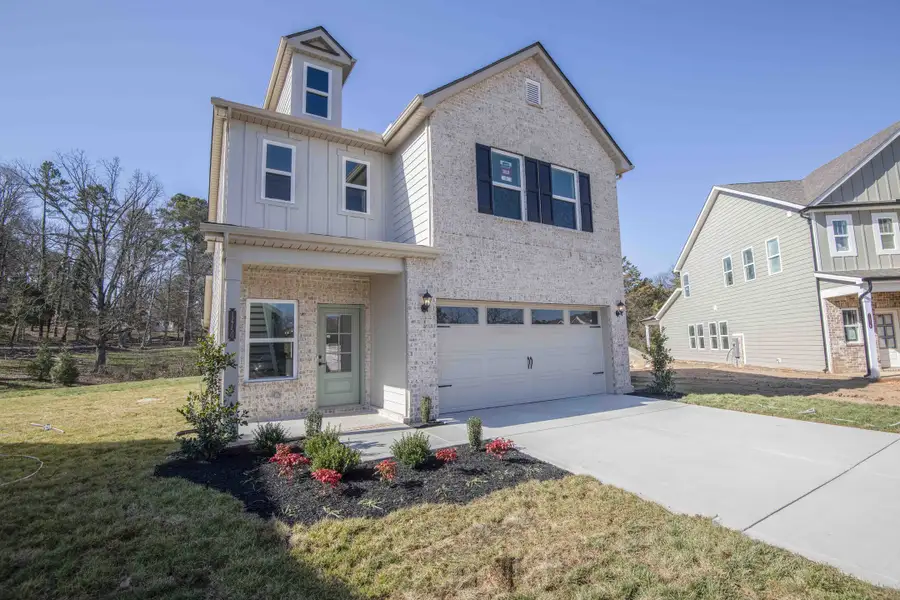 *Photo of example home. Traditional Elevation. Selections and finishes may vary.