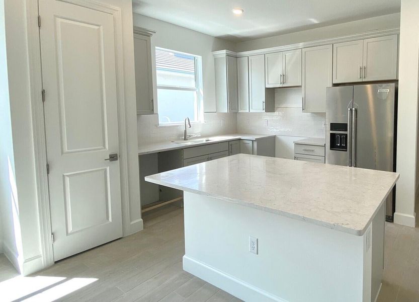 Furnished interior view inside a new home in Costa Pointe, Vero Beach (Image 12).