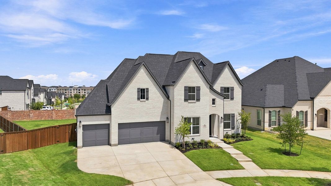 Front exterior of a new home in Estates at Rockhill, Frisco, TX, highlighting curb appeal (Image 25). Front exterior of a new home in Estates at Rockhill, Frisco, TX, highlighting curb appeal (Image 25).