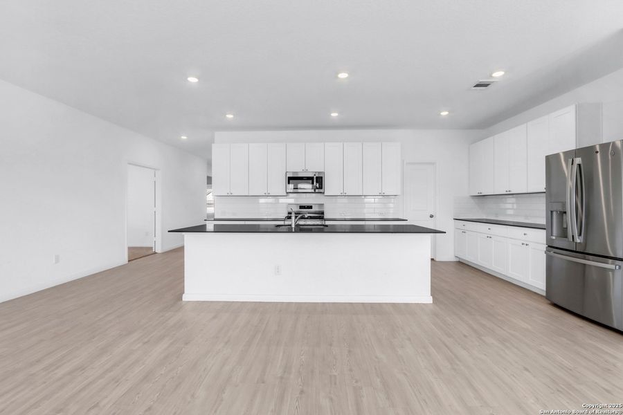 Furnished interior view inside a new home in Navarro Ranch: Classic Collection, Seguin (Image 8).