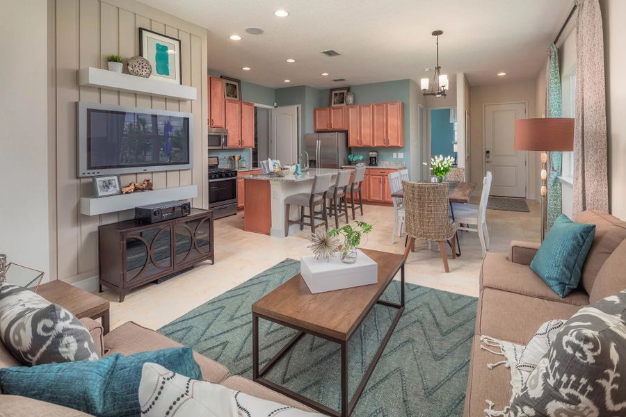 Representative furnished interior of a home built from the Amelia by Jones Homes USA in Twin Lakes, St. Cloud (Image 3).