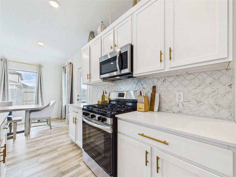 Furnished interior view inside a new home in Sterling Point at Baytown Crossings: Wildflower II Collection, Baytown (Image 30). Furnished interior view inside a new home in Sterling Point at Baytown Crossings: Wildflower II Collection, Baytown (Image 30).