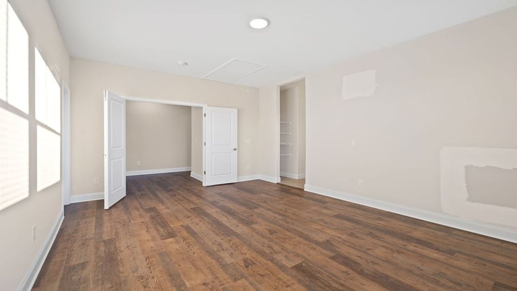 Spacious, unfurnished interior of a new home in Bentley Manor, Greer (Image 32).