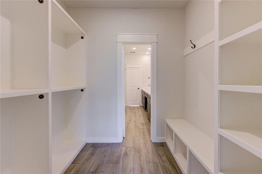 Bedrooms have built-in shelves in the closets