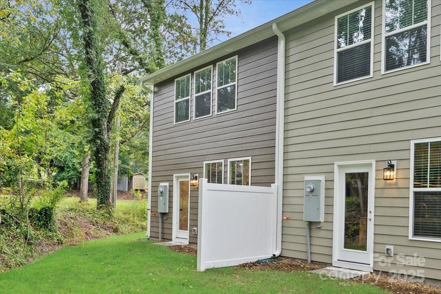 Exterior details and patio area of a home in Clayton Crossing, Arden (Image 3).