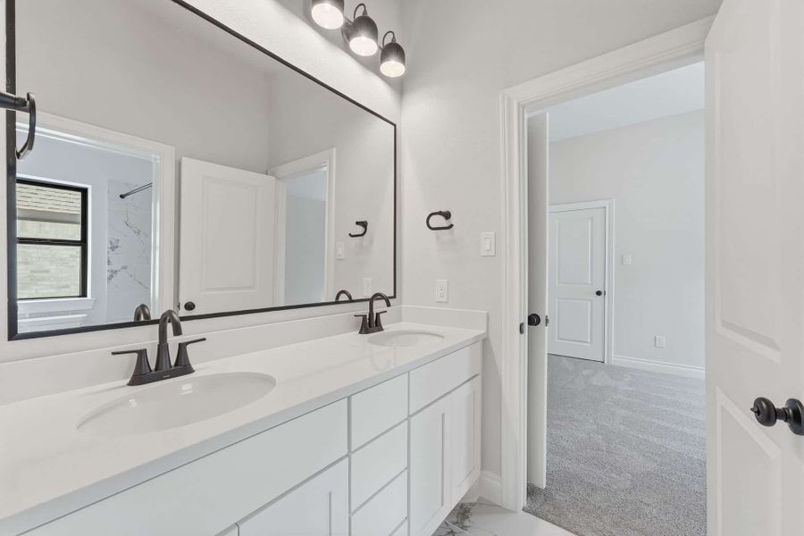 Furnished interior view inside a new home in Bridgeland 50′, Cypress (Image 16).