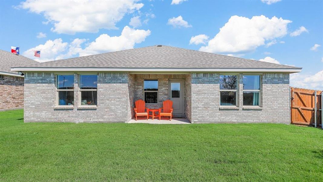 Rear Elevation and covered back Patio - All Home and community information, including pricing, included features, terms, availability and amenities, are subject to change at any time without notice or obligation. All Drawings, pictures, photographs, video, square footages, floor plans, elevations, features, colors and sizes are approximate for illustration purposes only and will vary from the homes as built.