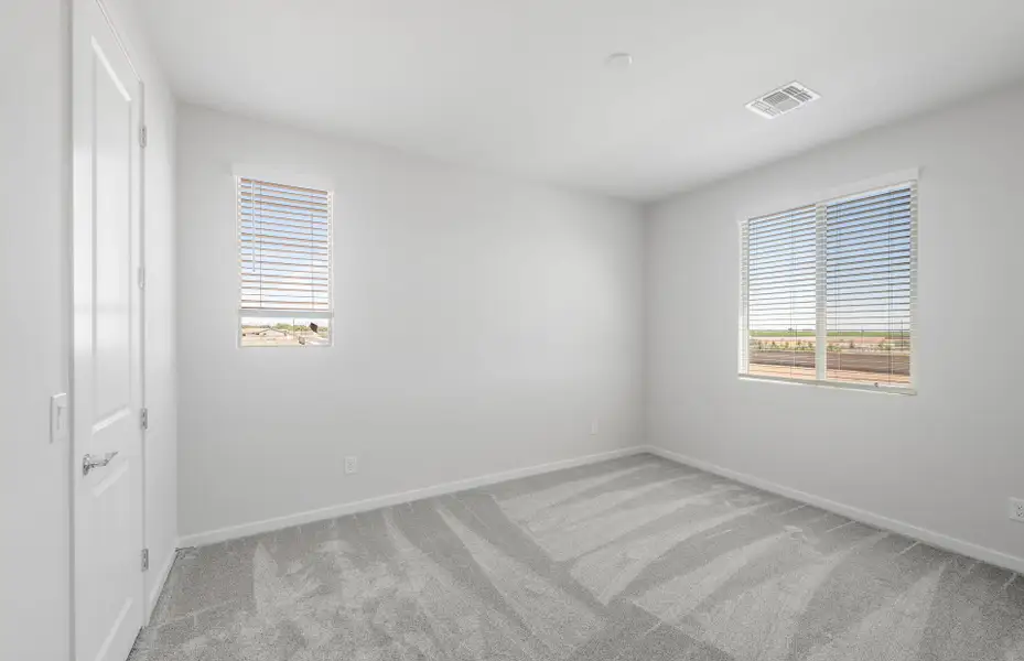 Spacious, unfurnished interior of a new home in Soleo, San Tan Valley (Image 24).