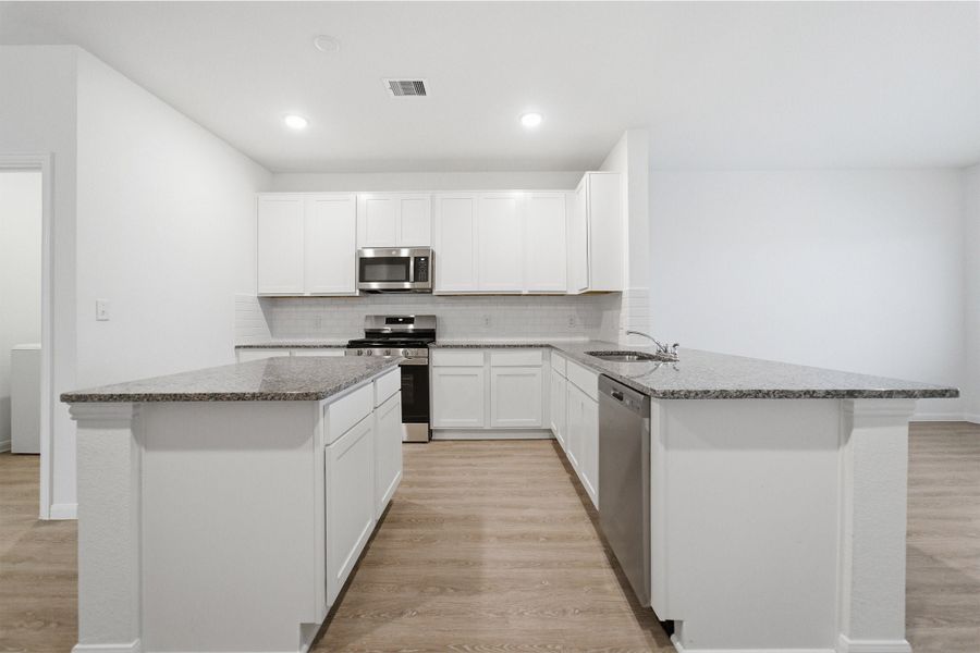 Furnished interior view inside a new home in The Canopies, Splendora (Image 7).