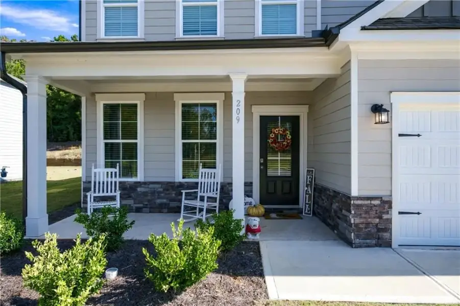 Exterior details and patio area of a home in Sutton’s Landing, Statham (Image 3).