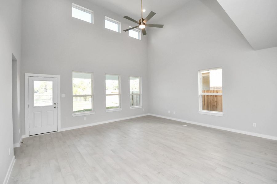 Discover another view of the family room. Sample photo of completed home with similar floor plan. Actual colors and selections may vary.