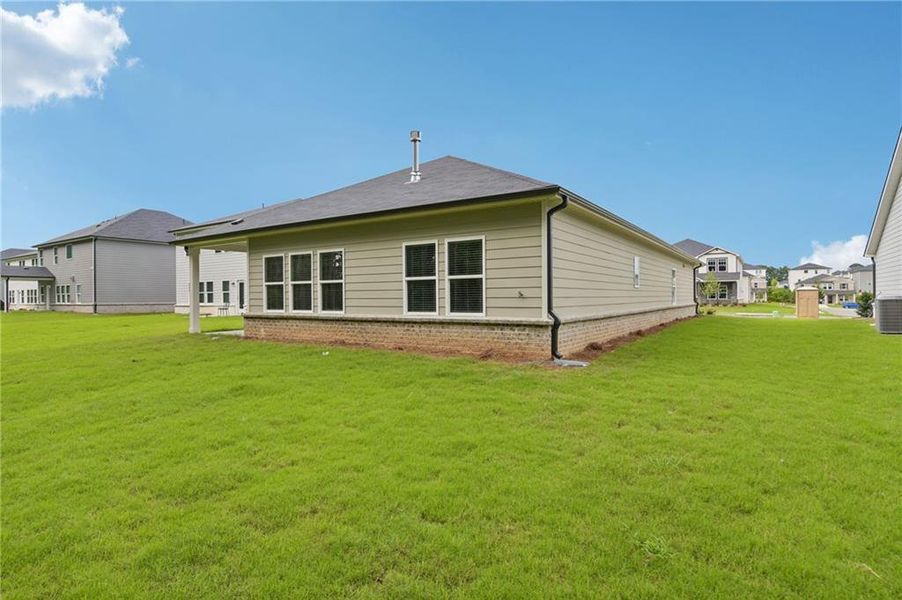 Exterior details and patio area of a home in Parkside at Grayson, Grayson (Image 30).