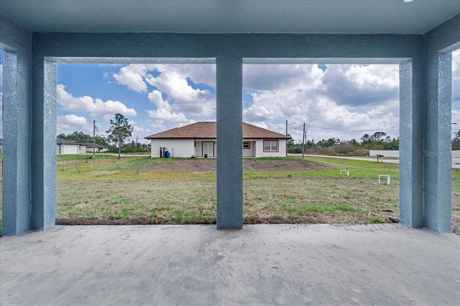 Exterior details and patio area of a home in , Lehigh Acres (Image 4). Exterior details and patio area of a home in , Lehigh Acres (Image 4).