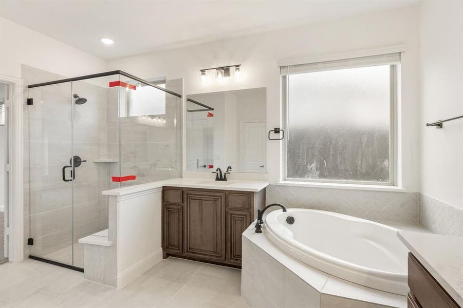 Furnished interior view inside a new home in Villages of Hurricane Creek, Anna (Image 20).