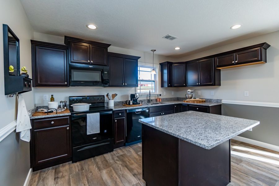 Representative furnished interior of a home built from the Clifton by Enchanted Homes in Hampshire Heights, Moore (Image 38).