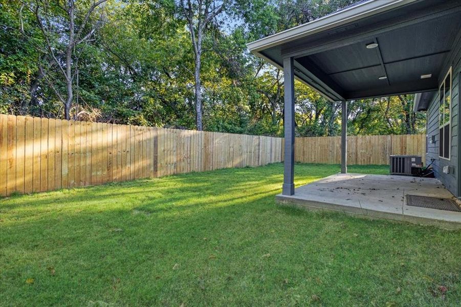 Exterior details and patio area of a home in , Denison (Image 18). Exterior details and patio area of a home in , Denison (Image 18).