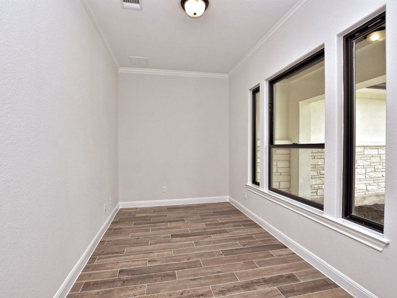 Representative unfurnished interior of a home built from the Santa Barbara II by Giddens Homes in Scofield Farms Estates, Georgetown (Image 149).