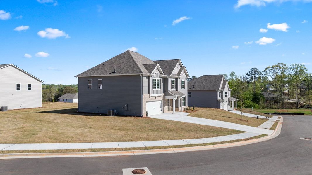 Representative exterior photo of a completed home built from the HALTON by D.R. Horton in Thompson Ridge, Dallas, GA (Image 22). Representative exterior photo of a completed home built from the HALTON by D.R. Horton in Thompson Ridge, Dallas, GA (Image 22).