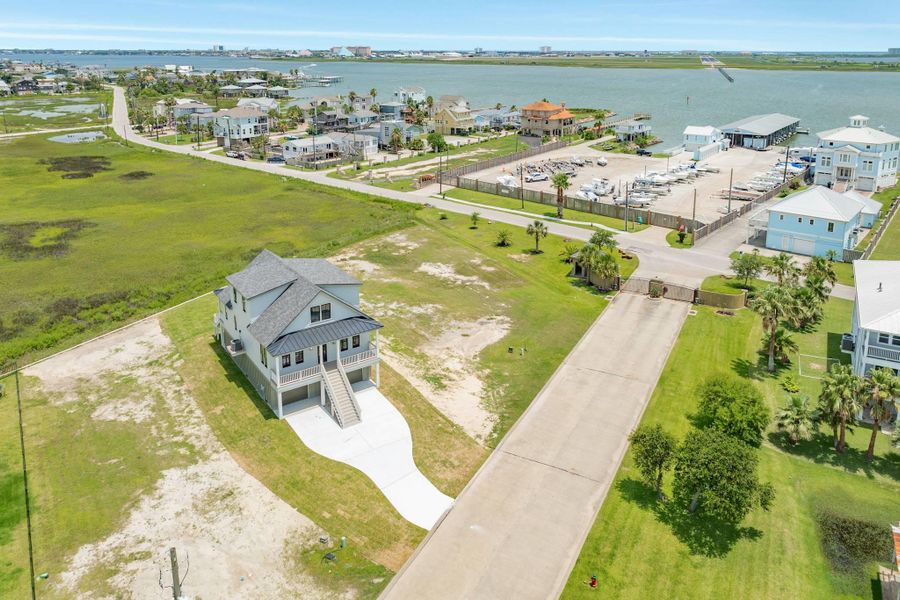 Front exterior of a new home in , Galveston, TX, highlighting curb appeal (Image 27).