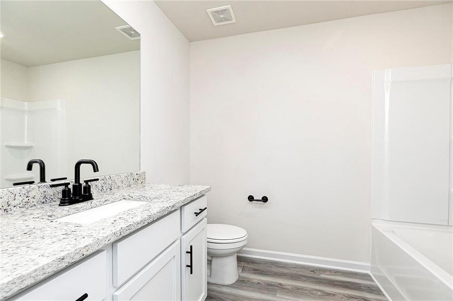 Furnished interior view inside a new home in Lake Preserve at Jackson Trail, Jefferson (Image 4). Furnished interior view inside a new home in Lake Preserve at Jackson Trail, Jefferson (Image 4).