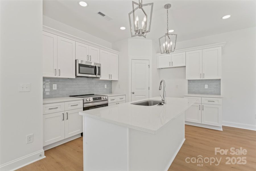 Furnished interior view inside a new home in , Albemarle (Image 12). Furnished interior view inside a new home in , Albemarle (Image 12).