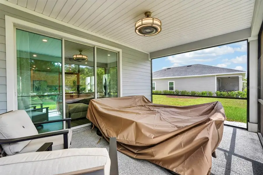 Exterior details and patio area of a home in , Ormond Beach (Image 26).