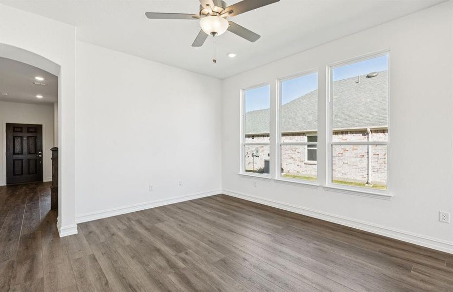 Formal dining room with large windows Formal dining room with large windows