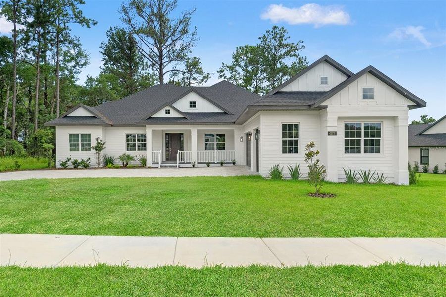 Front exterior of a new home in Southern Hills Plantation, Brooksville, FL, highlighting curb appeal (Image 26).