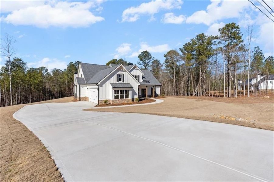 Front exterior of a new home in , Waleska, GA, highlighting curb appeal (Image 26).