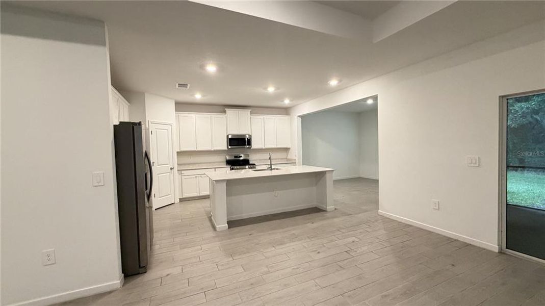 Furnished interior view inside a new home in Grand Park North, Dunnellon (Image 9).