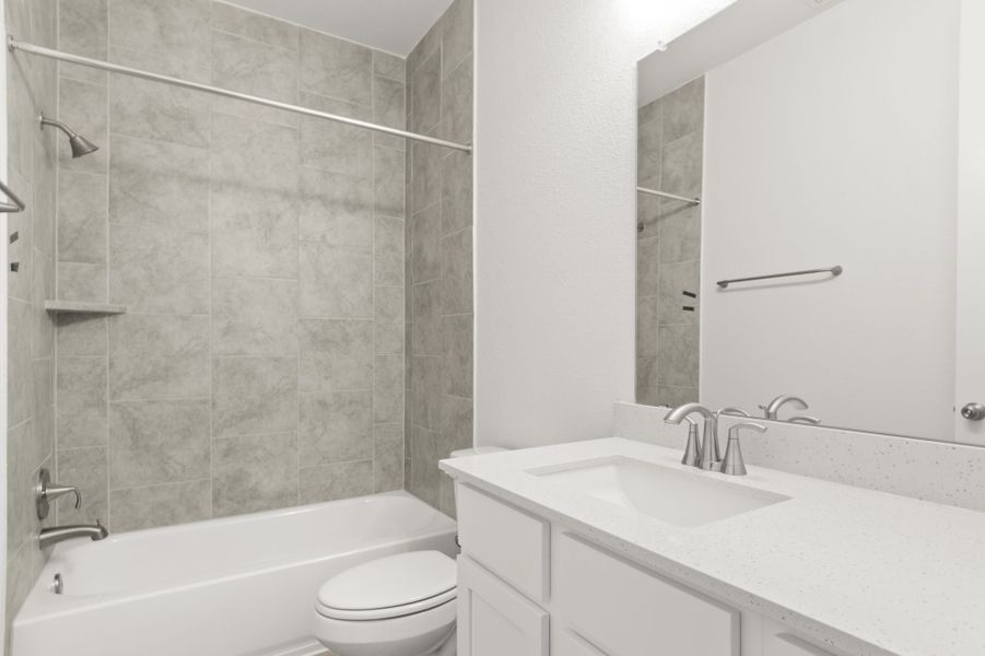 Furnished interior view inside a new home in Center 45, Round Rock (Image 13).