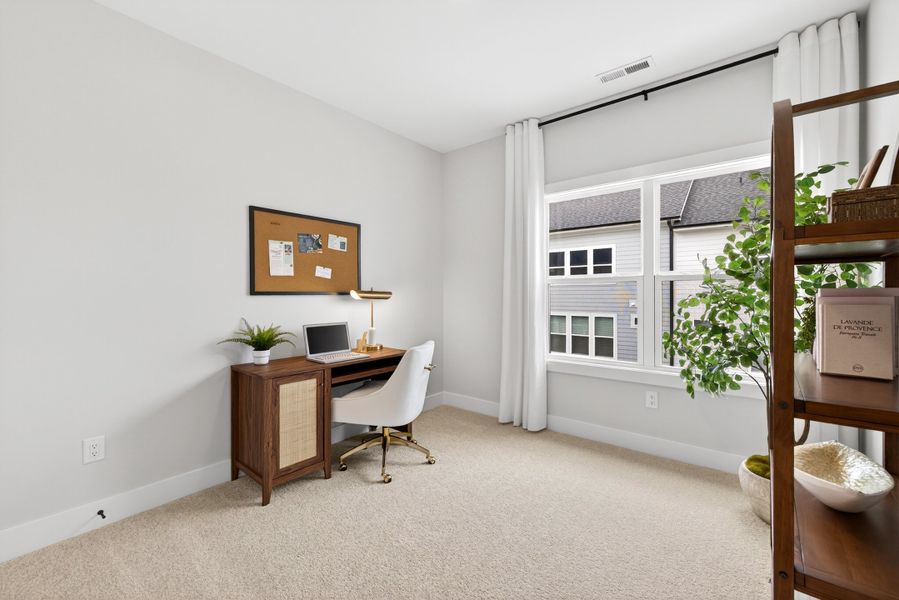 Representative furnished interior of a home built from the Cora End Unit by Baker Residential in Atwater Station - Midtown Collection, Fuquay Varina (Image 28). Representative furnished interior of a home built from the Cora End Unit by Baker Residential in Atwater Station - Midtown Collection, Fuquay Varina (Image 28).